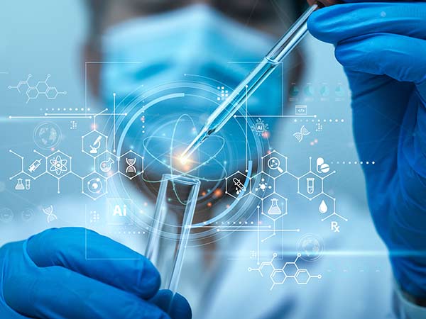 scientist using test tube and liquid dropper