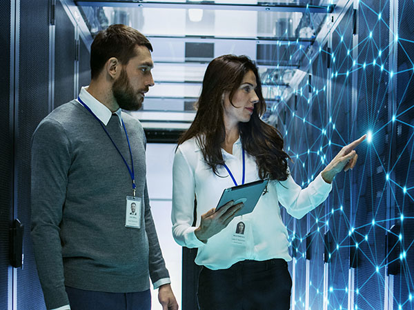 two people in server room