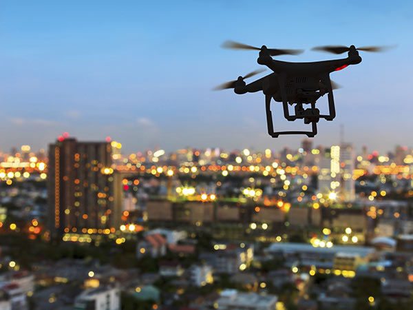 drone flying above city