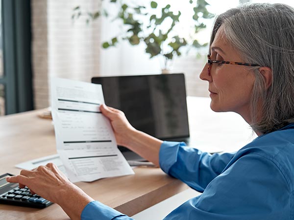 woman checking calculations