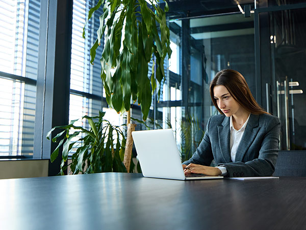 woman working on laptop