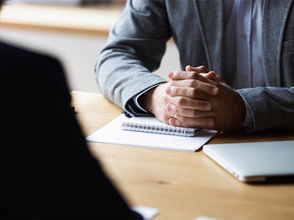 two men in an interview