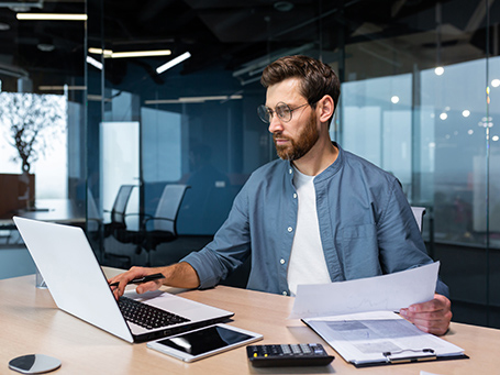 man using laptop